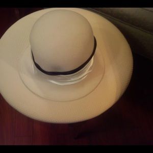 White/Ivory Hat with black velvet band.